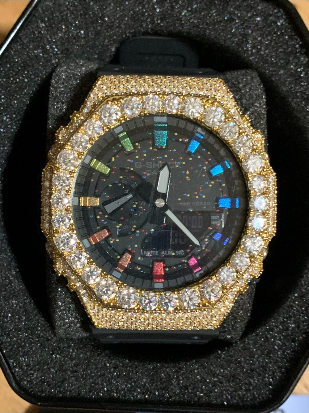 Casio G-SHOCK Gold Bezel Black Strap Multicolor Dial Accents